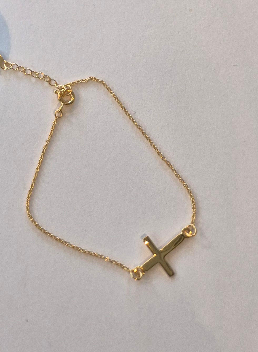 Gold cross bracelet